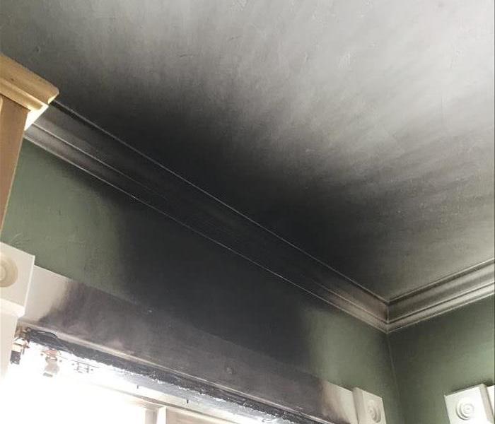 smoke damage on a white ceiling